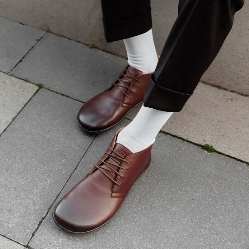 Groundies Milano са абсолютната класика: елегантни, боси обувки от естествена кожа. Моделът, стигащ до глезена, подобрява почти всеки гардероб със стил.